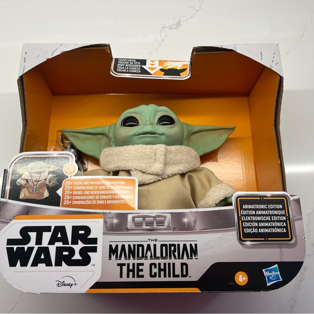 NIB - Star Wars - The Mandalorian Child
